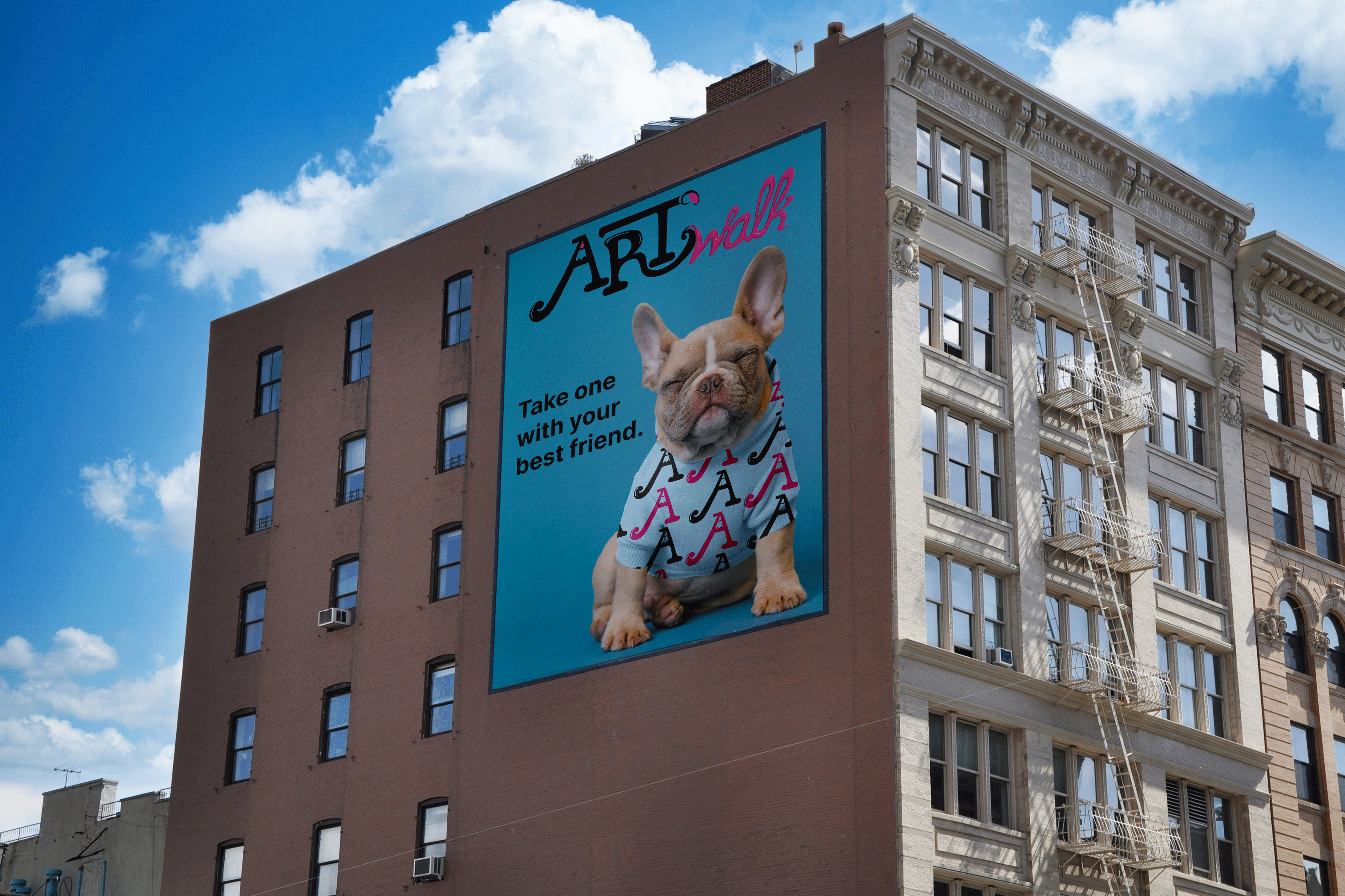 a french bulldog in a hoodie with ArtWalk monogram logos on it in an ad on the side of a building